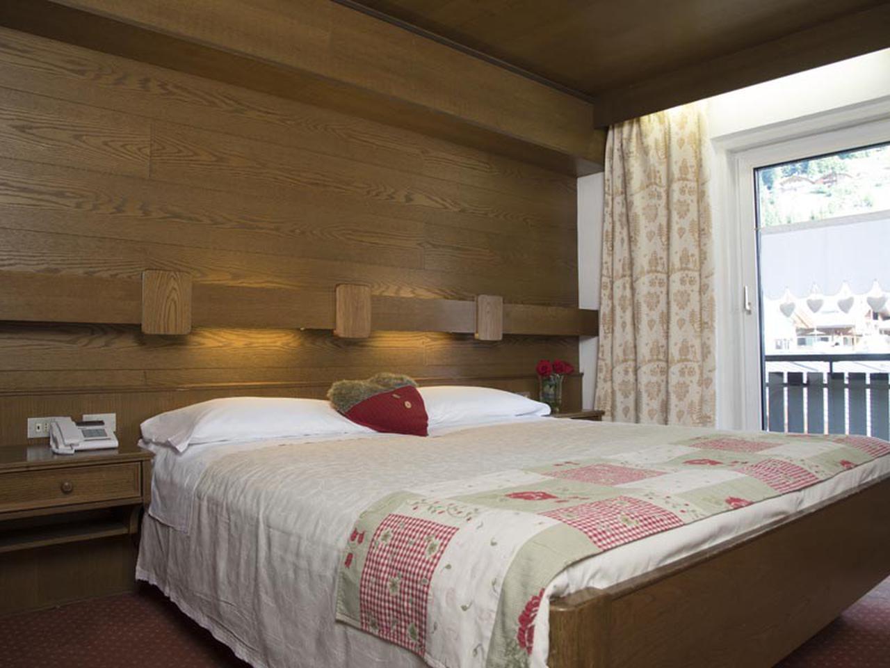 Sporthotel Enrosadira kamer aan de piste Sporthotel Enrosadira kamer aan de piste